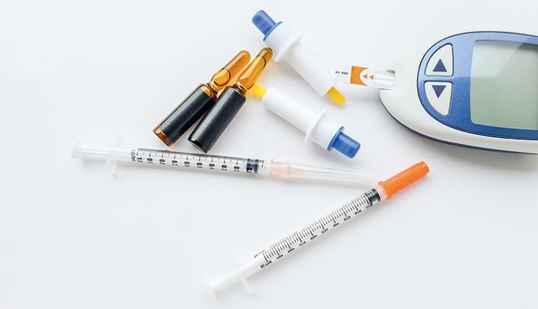 Prikken voor het meten van een diabetes hypo